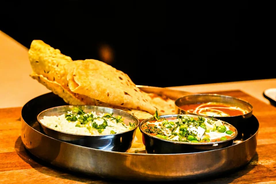 North Indian thali with naan, curry and rice